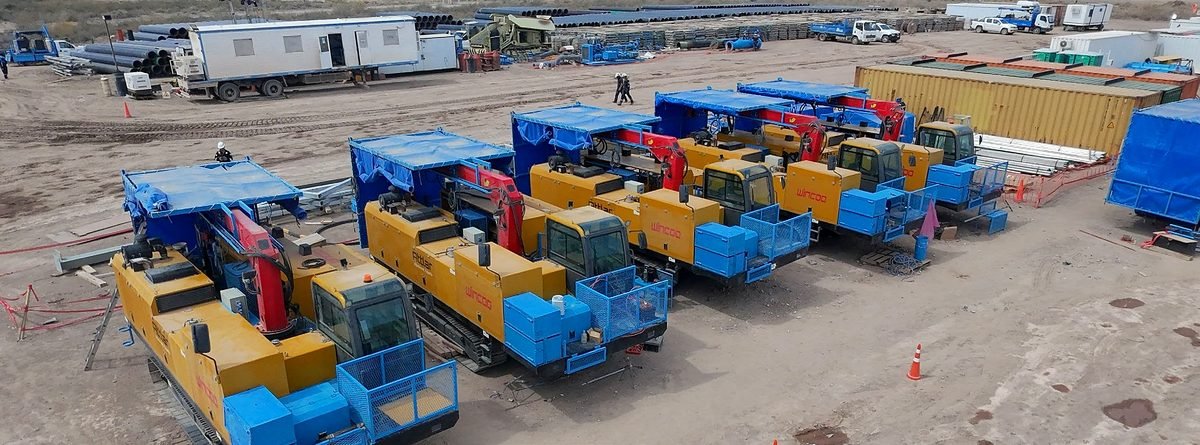 GPS modular dredge pontoons lined up on the water