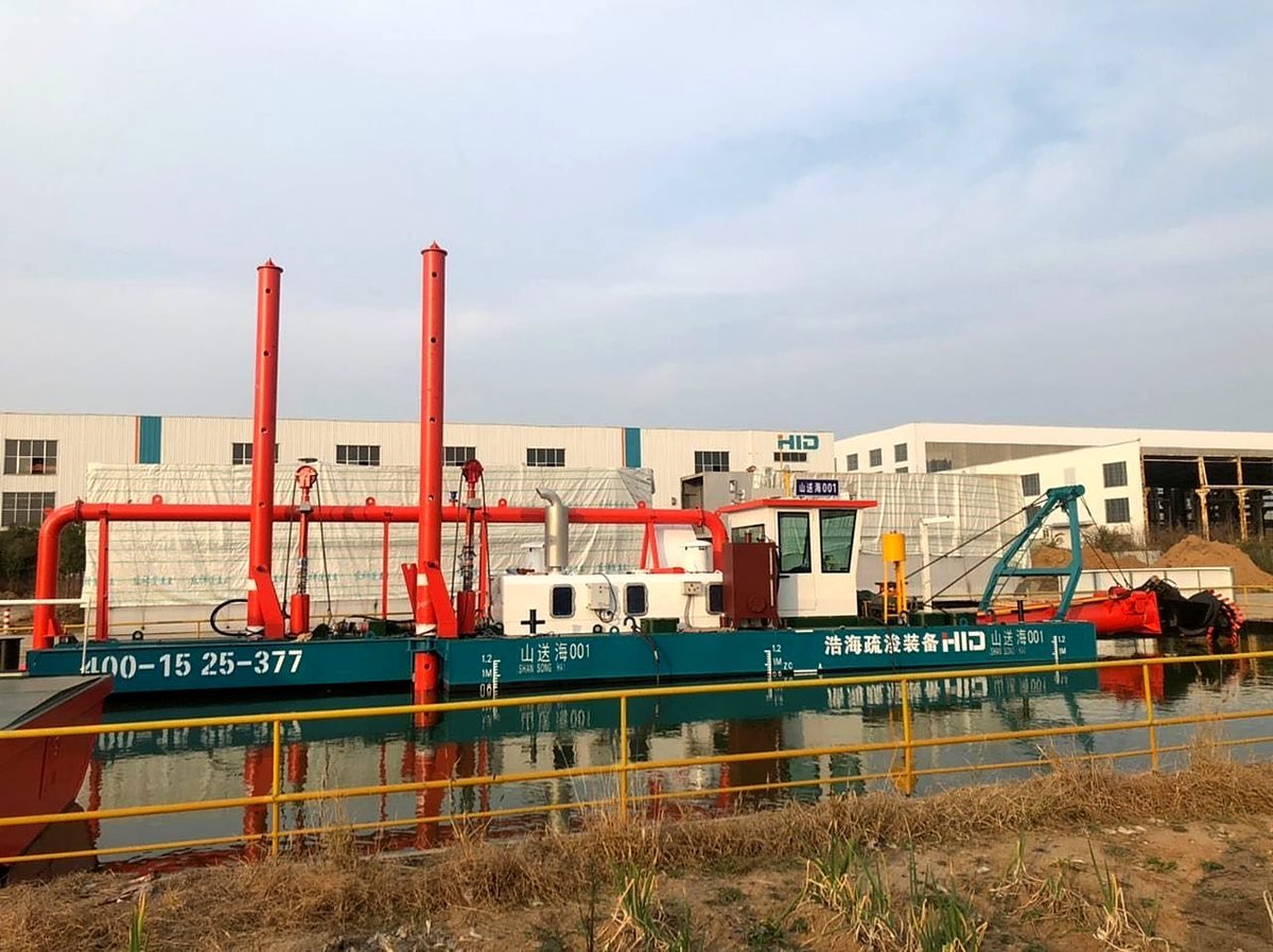 GPS piling and lifting rigs on barges over water